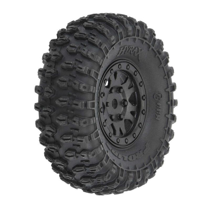 Pneus Pro-Line Hyrax 1,0" montés sur roues hexagonales Mini Impulse noires internes Bead-Loc de 7 mm (4) pour SCX24 avant ou arrière 