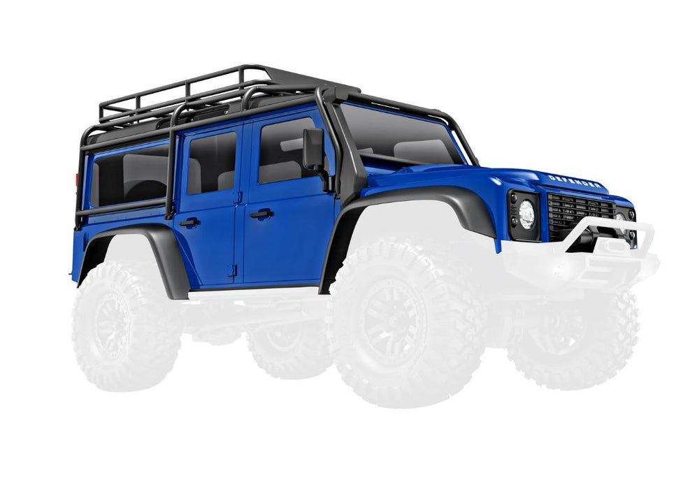 Traxxas Body, Land Rover Defender, Complete, Blue  (Includes Grille, Side Mirrors, Door Handles, Fender Flares, Fuel Canisters, Jack, Spare Tire Mount, & Clipless Mounting) (Requires #9734 Front & Rear Bumpers)